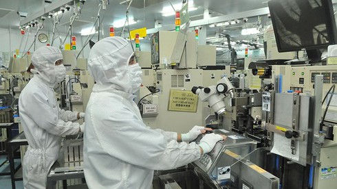 Manufacturing semiconductors at MTEX - a Japanese invested company in Vietnam (Photo: Cao Thang) Manufacturing semiconductors at MTEX - a Japanese invested company in Vietnam (Photo: Cao Thang)